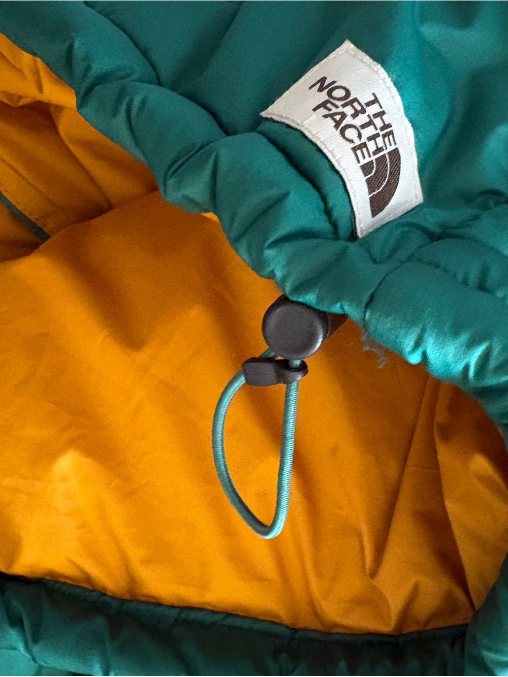 The North Face Teal and Black Chevron Puffer Vest Size M like new - Picture 3 of 3
